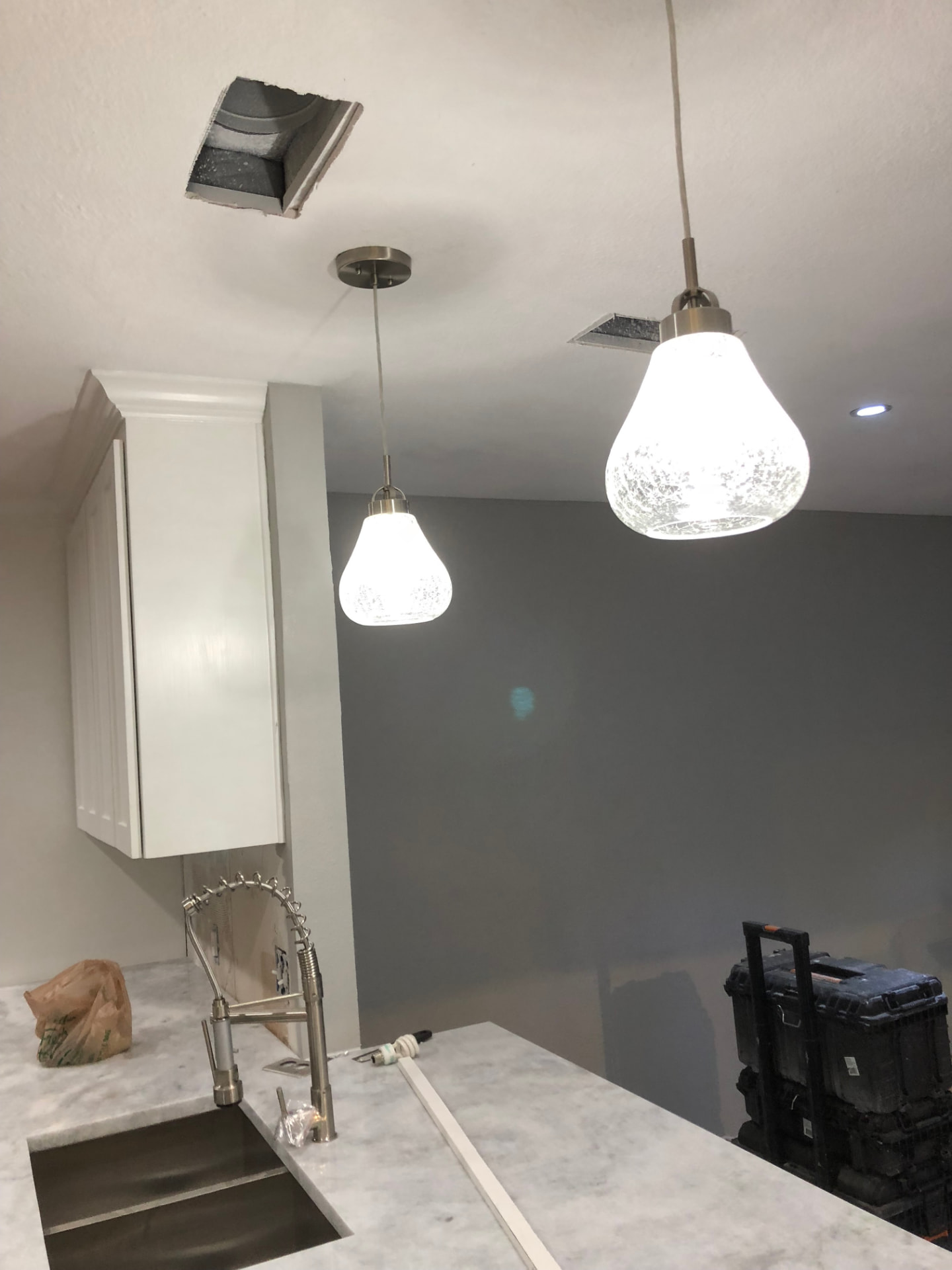 Kitchen pendant lighting and ceiling work in progress