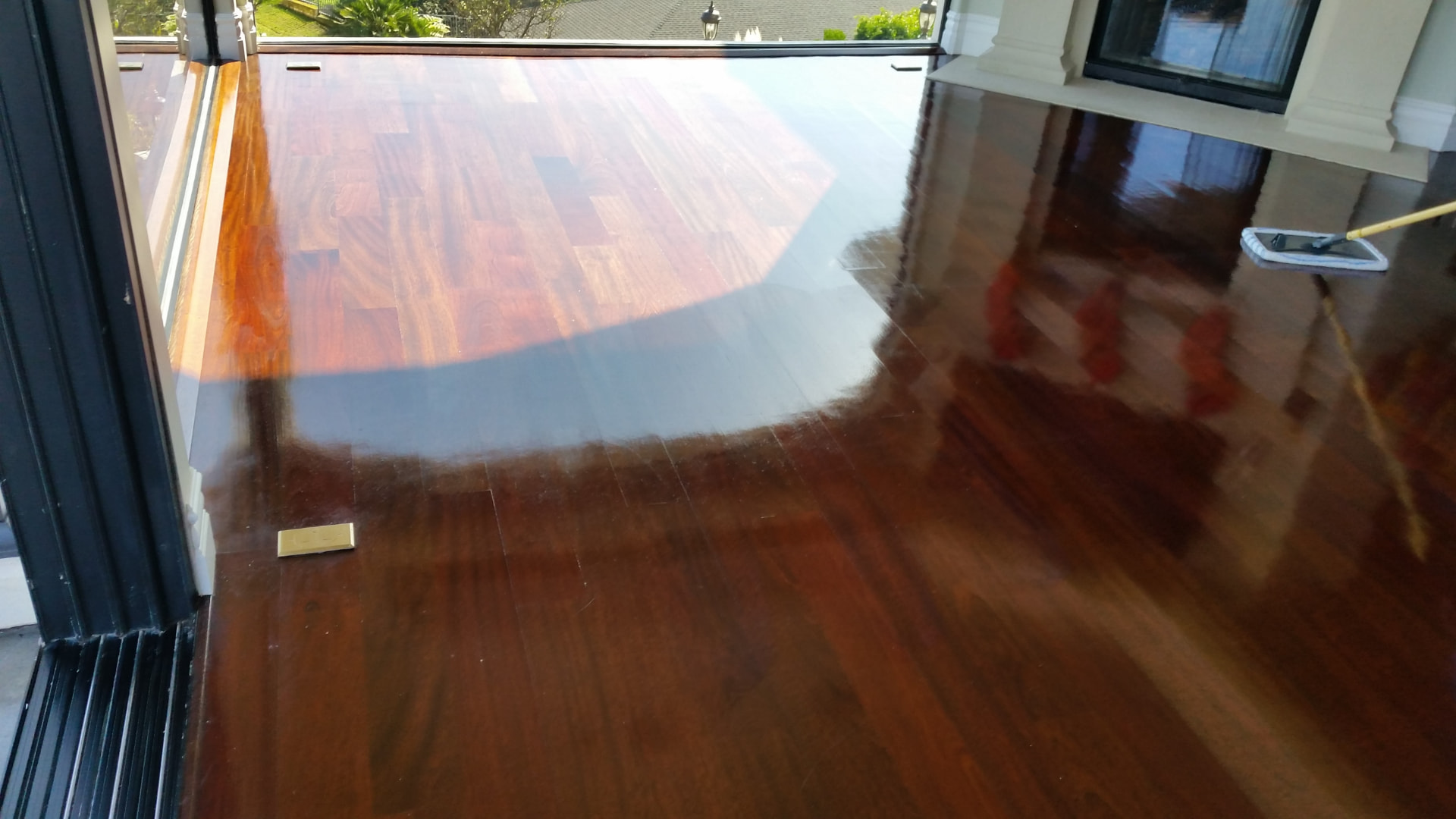 Restored hardwood floor with a polished finish